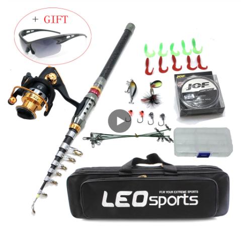 "Fishing rod and tackle box setup by a lake at sunrise"