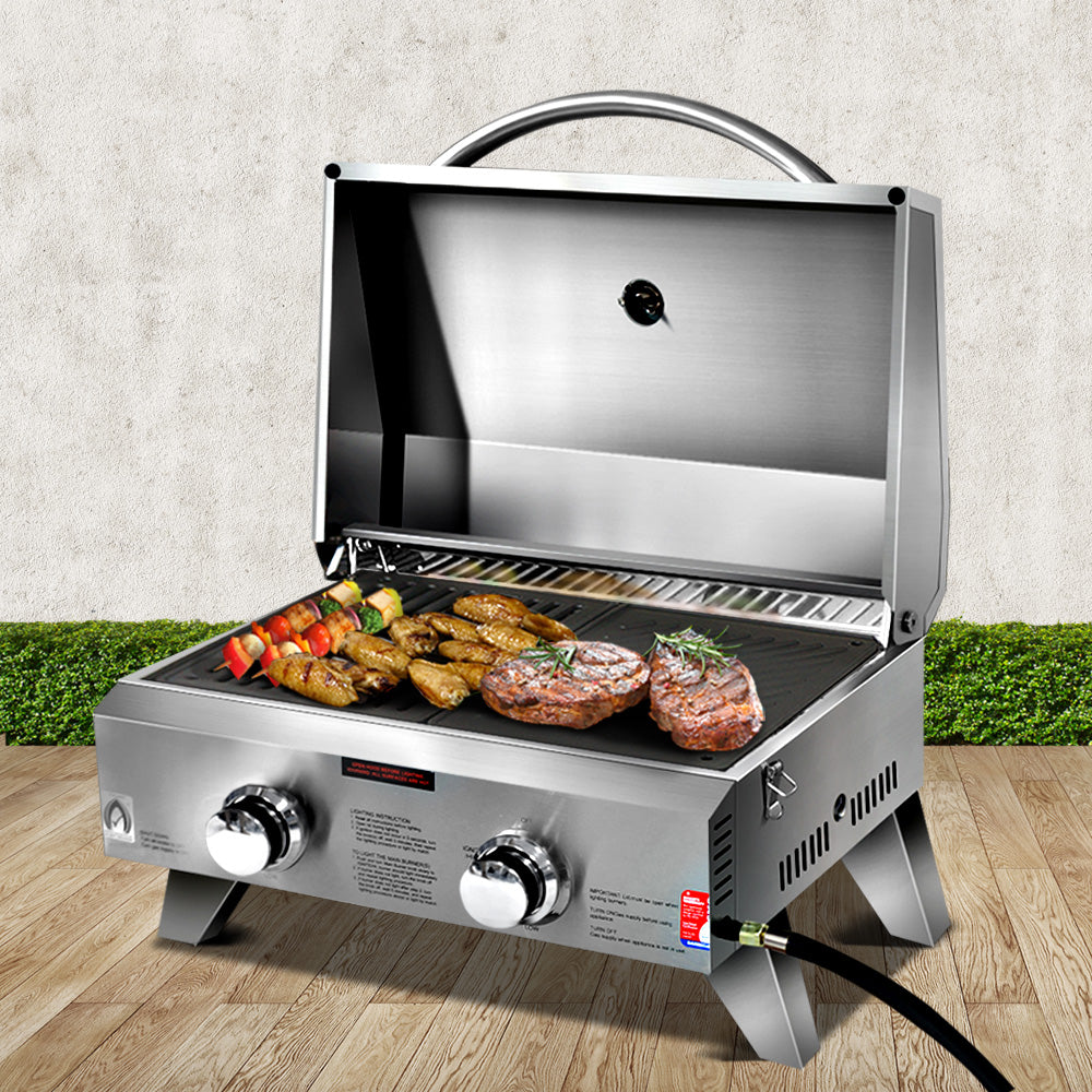 BBQs and grilling accessories for outdoor cooking.