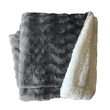 Warm throws and soft blankets for beds and couches.