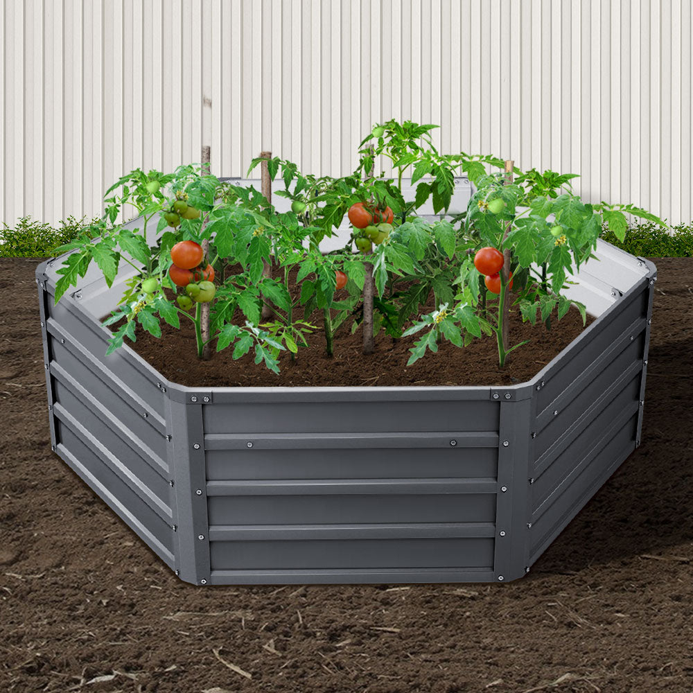 Raised garden beds and planters for healthy plant growth.