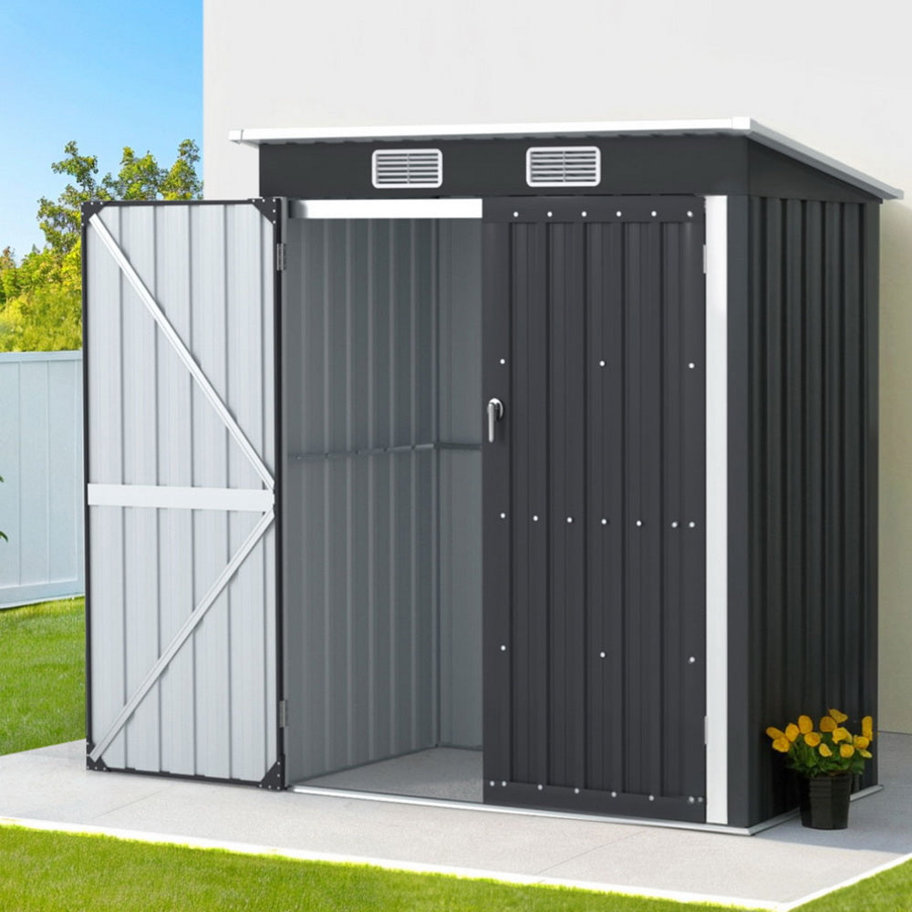 Outdoor pool storage sheds for garden and equipment.